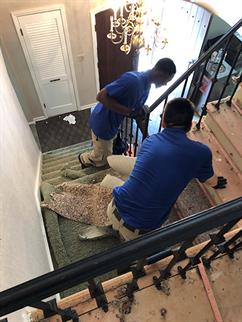 Cleaning up water damage on stairs